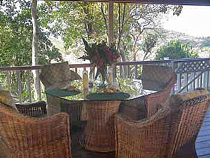 St John vacation rental Meridian outdoor dining on covered deck with expansive views
