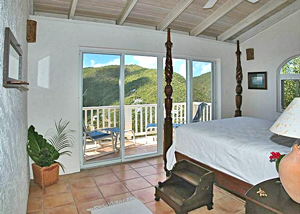 Sea Turtle master bedroom suite 1 with mahogany furniture and views