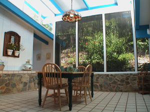 St John USVI vacation rental Tesseract outdoor dining on spacious deck overlooking the pool
